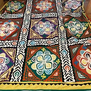 Overlay embroidery throw